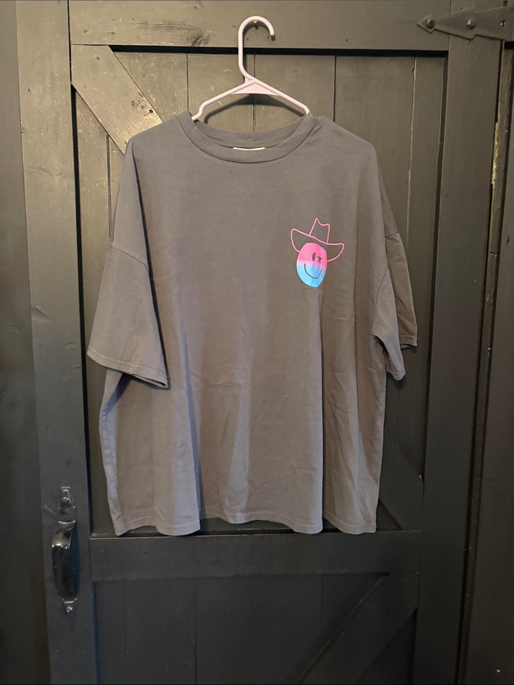 Relaxed Grey Short Sleeve Tee with Pink & Blue Cowboy Smile Graphic